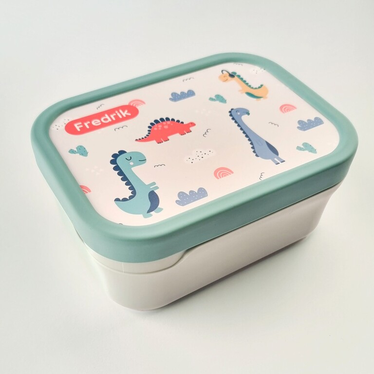 Grüne Brotdose mit Dinosaurier-Design und Namen